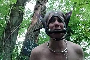 Ponygirl Slave Bent Over in Forest Takes Buttplug and Doggystyle Pounding!