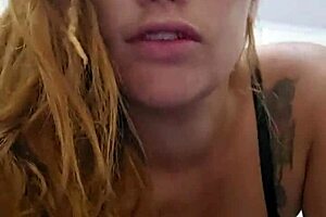 gorgeous redhead flashes her perky tits and pink wet pussy solo