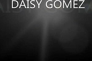 Daisy Gomez dances seductively on webcam, teasing her curves for viewers.