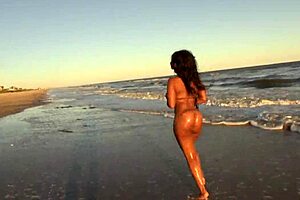 Ebony Big Ass Stripping Naked on Public Beach