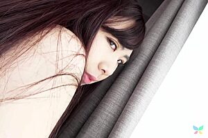 busty nozomi minami reveals shaved pussy up close