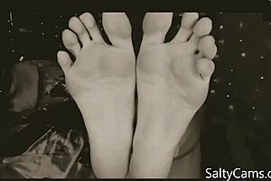 Teasing foot lover indulges in gentle toe worship