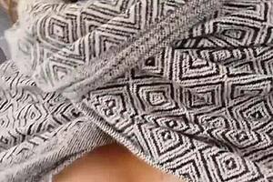 A flirty babe teases riders on the crowded train.