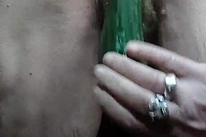 german granny stuffs hairy pussy with huge cucumber slut style