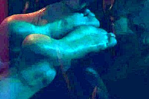 brunette slave licks toes hungrily like sweet dessert in femdom