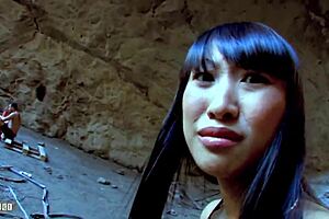 sharon lee the bigtits asian star gets roughly fucked anally deep in a dim cave