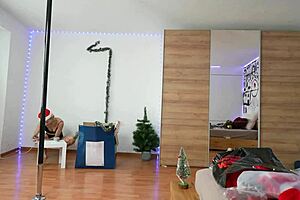 blonde's christmas pole dancing ass worship teases seductively!