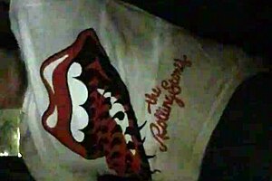 A big black ass bounces wildly on hood white guy inside moving car