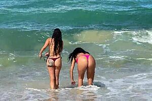 Two Stunning Brazilian Brunettes Kiss and Caress on Pristine Coral Beach Paradise
