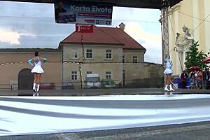 Cheerleader majorettes tempt with their perky assets up close