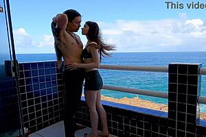 enjoying playful terrace moments overlooking the ocean with dollscult