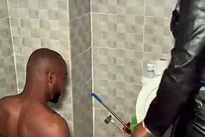 nigerian dominatrix whispers commands as slave trembles in submission