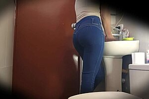 Hidden Camera Captures Curvy Latina's Bathroom Tease