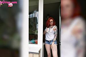 Sexy redhead teen babe soaks her big tits in wet t-shirt while horny window washing homemade.