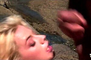 exhibitionist blonde takes double penetration in tight holes on beach