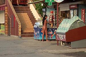 mischievous milf flashes nude body on public streets