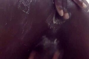 I'm jerking my big black cock in the shower!