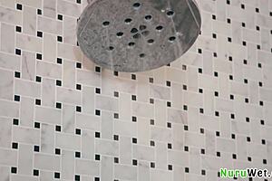 Sexy blonde busty Cherry Kiss prepares Milan Ponjevic for slippery nuru massage with big tits