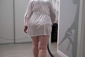 Chubby mature milf teases thick ass and saggy tits under short robe