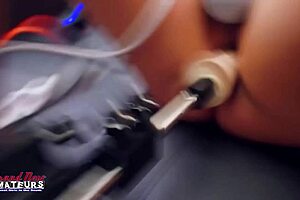 her clit vibrates wildly as fuck machine rams trimmed cunt