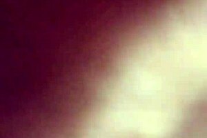 Captivating Brunette Reveals Tempting Curves Gracefully