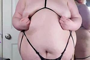 Bbw jiggles huge ass and belly seductively in tight lingerie solo