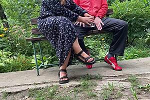 milf jerks huge cock into glass on park bench