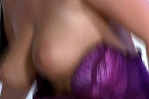 big titted slut in fishnets jerks cock onto her rack