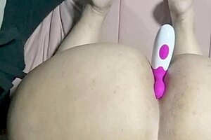 chubby mature woman rams medium vibrator into tight asshole for anal orgasm