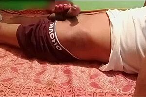 Desi Indian footjob milf strokes cock with feet