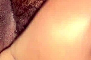 amateur flashes her massive hairy pussy up close