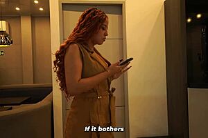 Distracted busty redhead succumbs to huge cock in men's bathroom