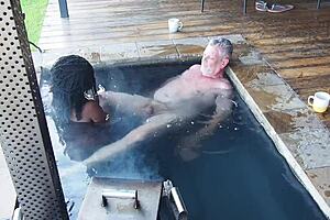 hey check out this ebony secretary riding her boss hard in the jacuzzi