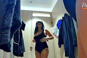 horny wife tries clothes then fingers shaved pussy to orgasm in public changing room