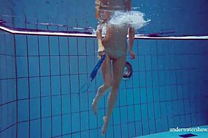 brunette martina flaunts tight pussy in blue bikini underwater at beach